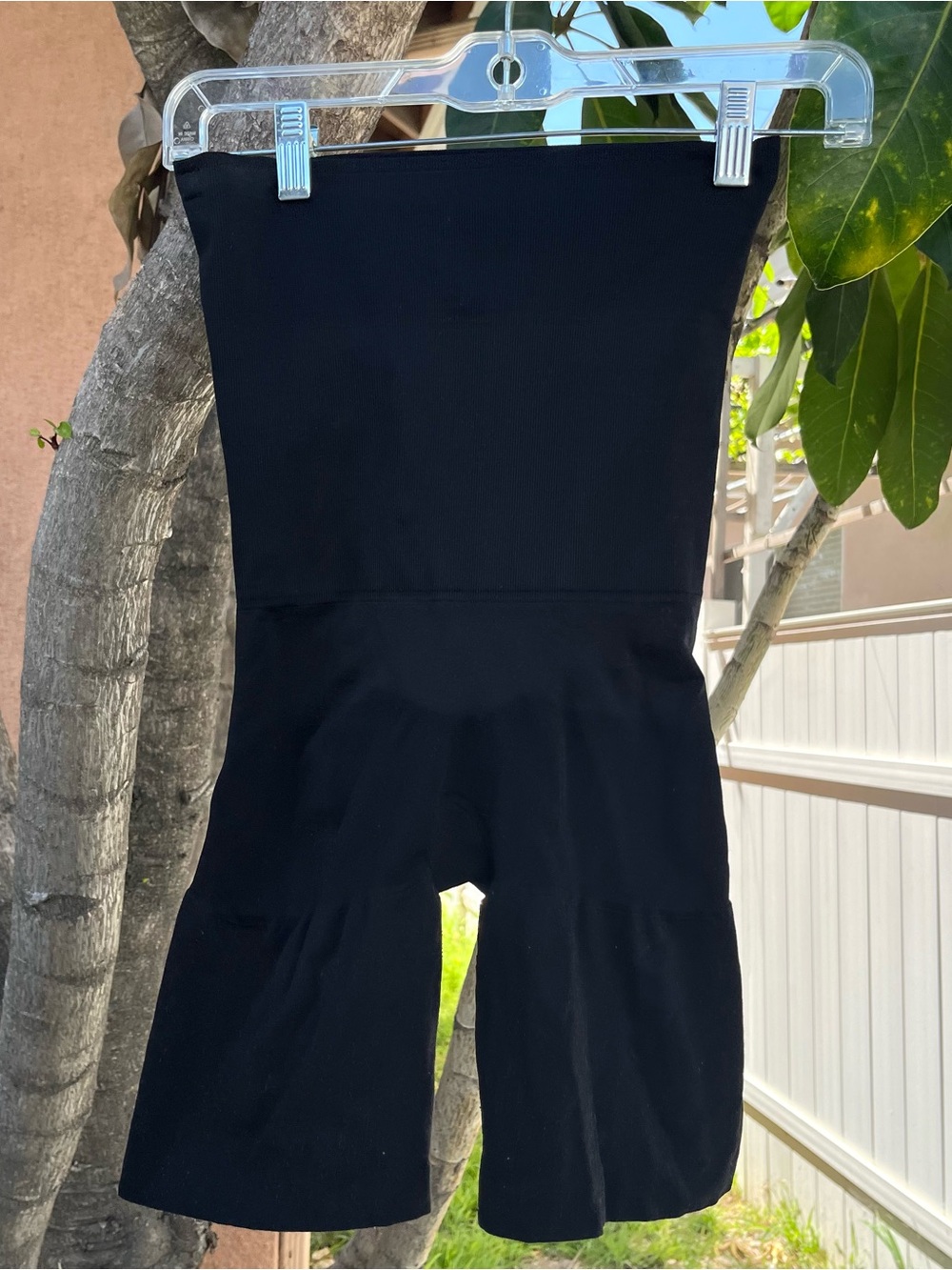 Assets by Spanx High Waisted Seamless Mid Thigh Shorts Shape Wear in Black.